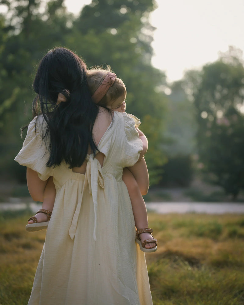 Tiffany and Josie at golden hour in the tall grass, photo 2. Orange County family photography.