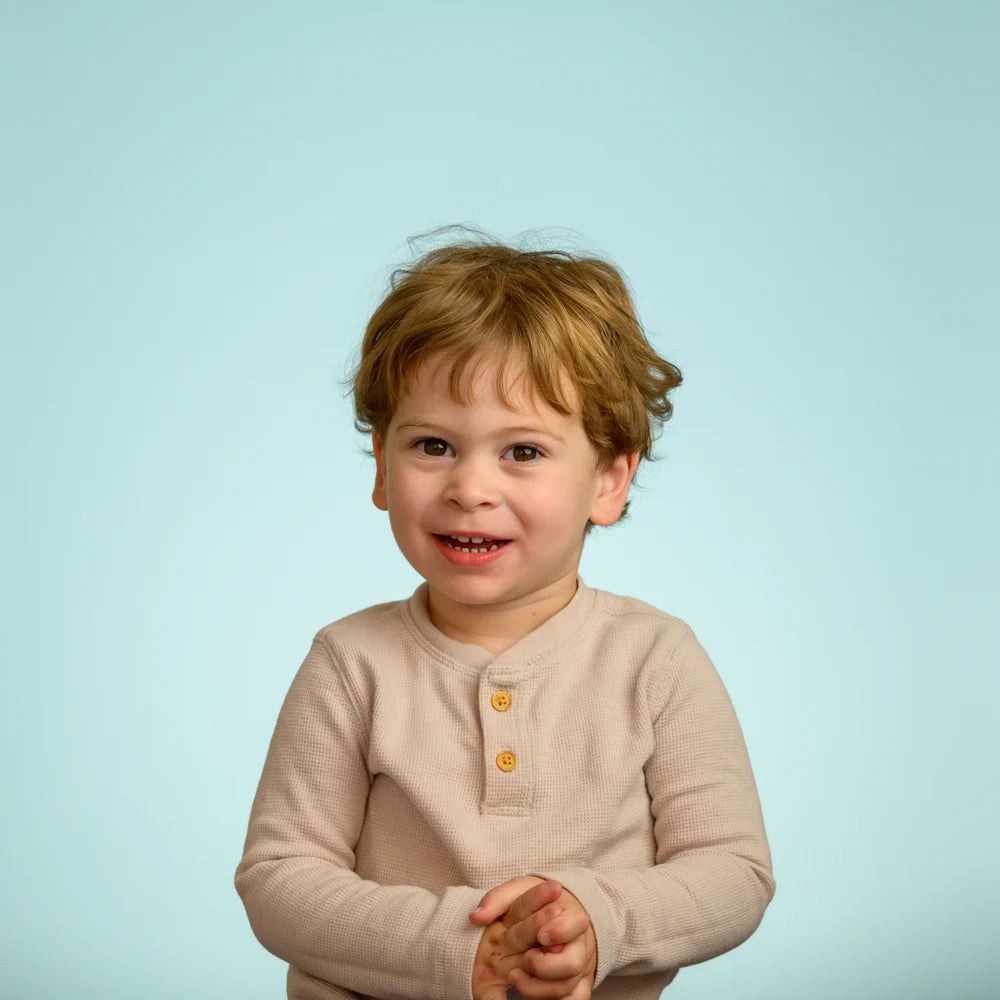 Studio portrait on blue seamless