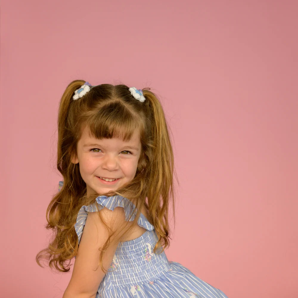 Studio portrait on pink seamless