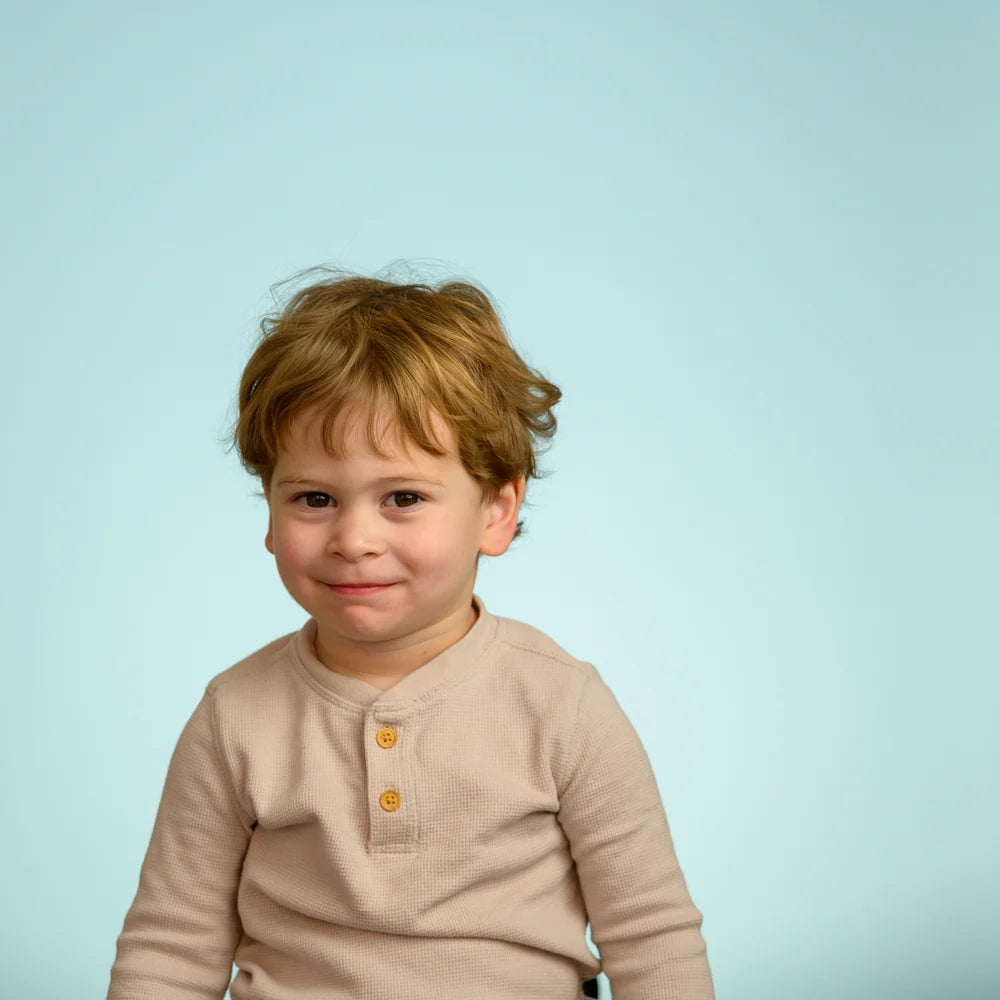 Studio portrait on blue seamless
