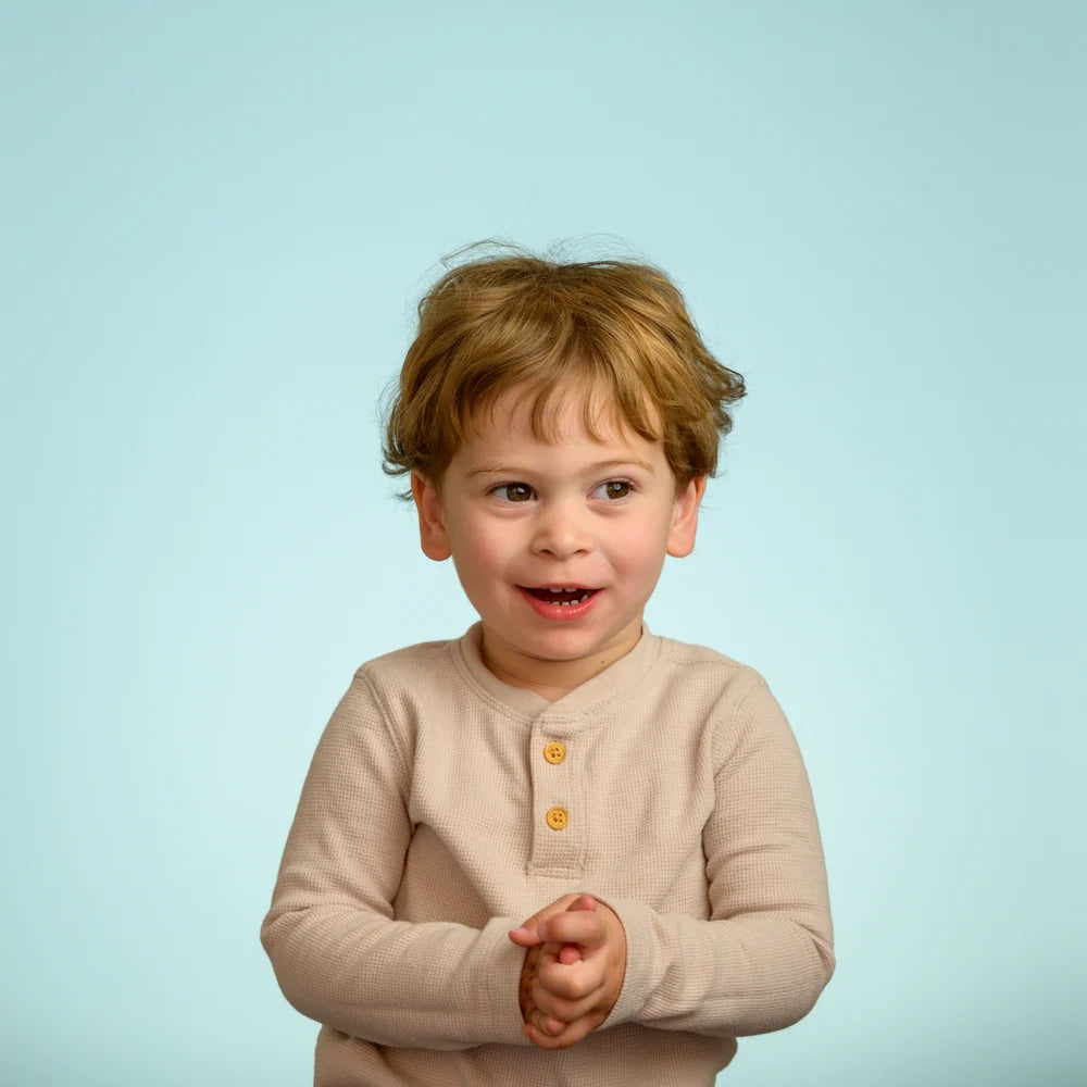 Studio portrait on blue seamless