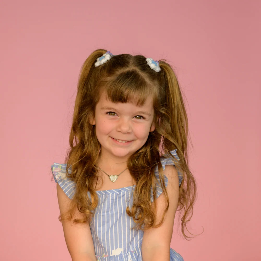 Studio portrait on pink seamless