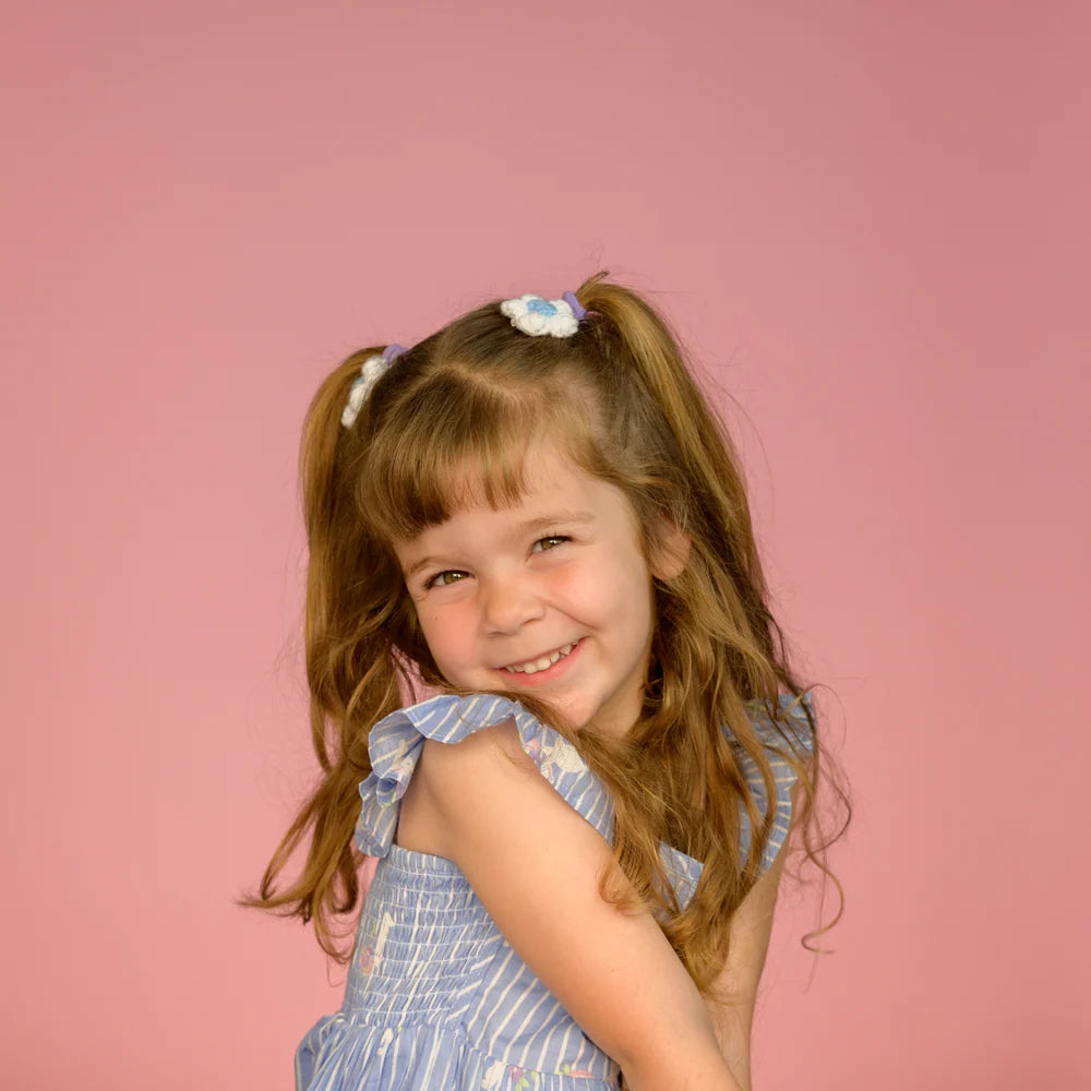 Studio portrait on pink seamless