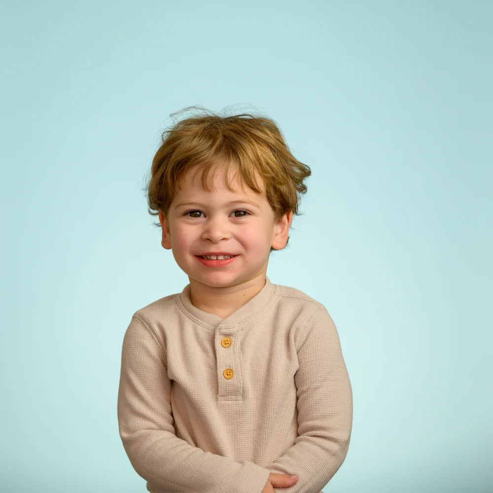 Studio portrait on blue seamless